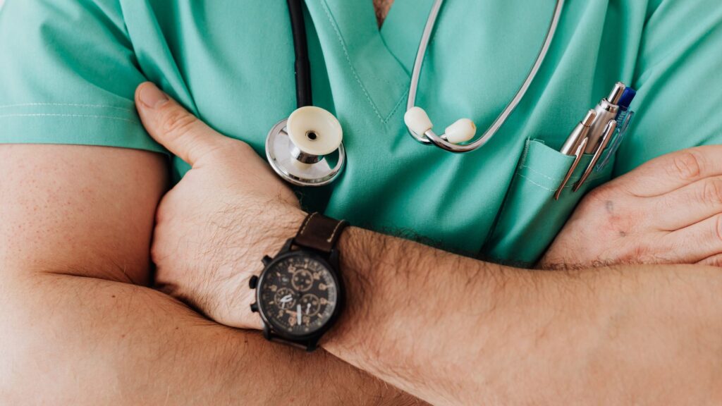 Healthcare profession worker wearing green scrub